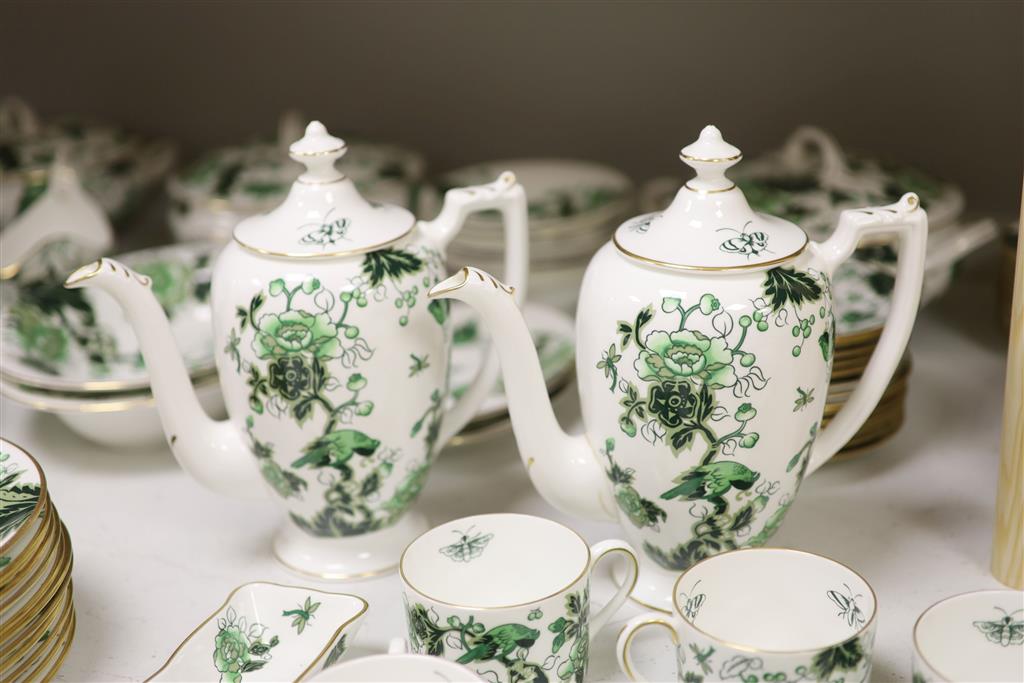 A Coalport Cathay peony pattern green dinner service for twelve settings